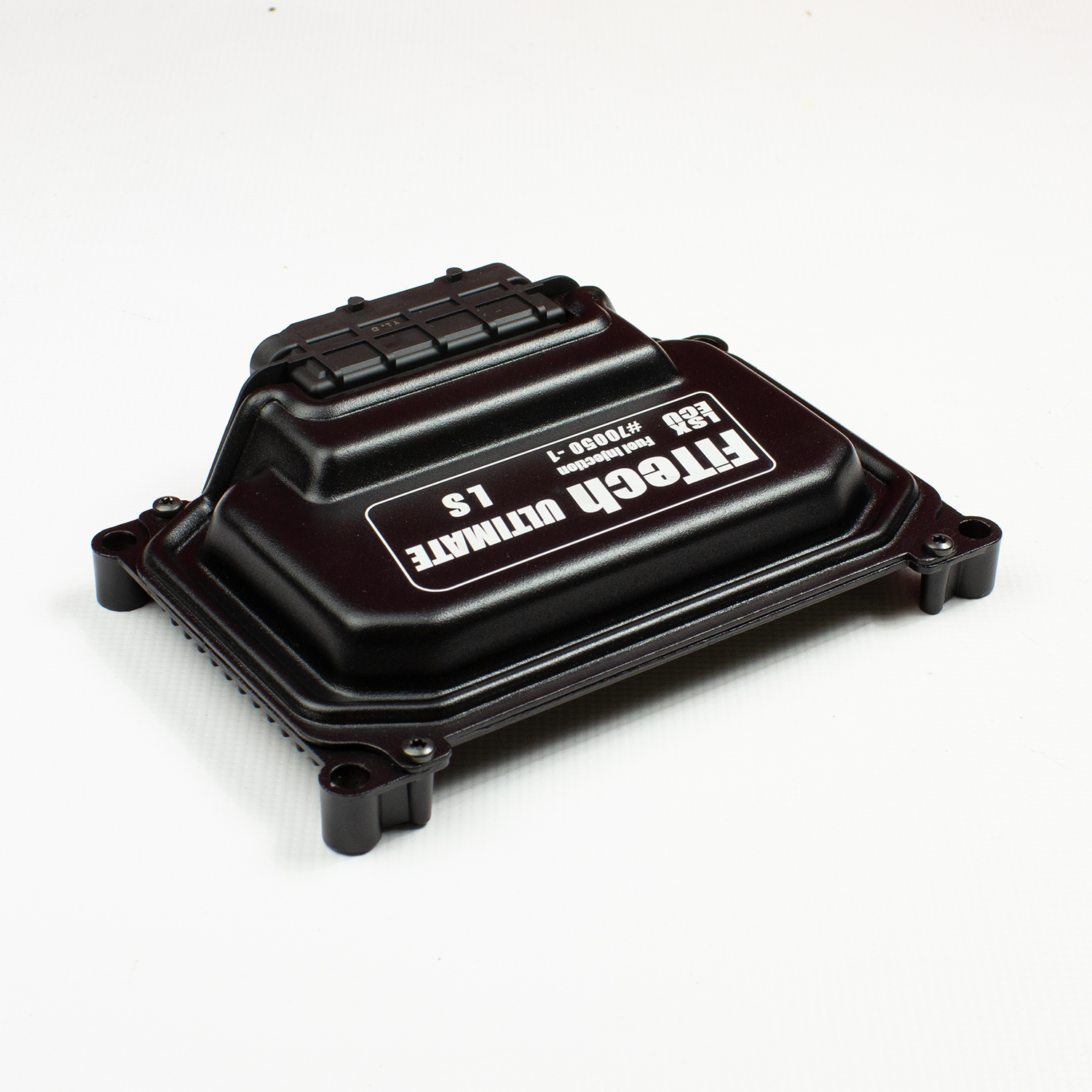 FiTech Ultimate LS replacement engine control unit (ECU) module showing the top side of the unit.